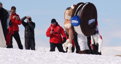 Kate Upton with a giant Oreo cookie.