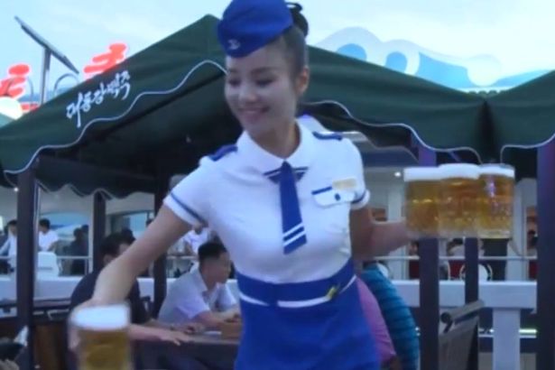 Barmaids serving at Pyongyang Beer Fest